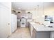 Modern kitchen with granite countertops and white appliances at 5149 Adelaide Dr, Kissimmee, FL 34746