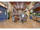 Spacious and bright lobby area with comfortable seating, tiled floors, and tasteful decor at 8939 Bismarck Palm Rd, Kissimmee, FL 34747