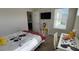 Charming bedroom featuring Mickey Mouse decor and an ensuite bathroom at 9271 Patrimonio Loop, Windermere, FL 34786