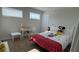Bright bedroom with Mickey Mouse bedding and a workspace at 9271 Patrimonio Loop, Windermere, FL 34786