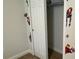 Small closet with shelving and hanging rod at 9271 Patrimonio Loop, Windermere, FL 34786