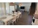 Dining area with a table and chairs, overlooking the living room at 9271 Patrimonio Loop, Windermere, FL 34786