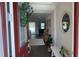 Bright and airy entryway with a view into the living area at 9271 Patrimonio Loop, Windermere, FL 34786