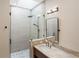 Elegant bathroom with a walk-in shower and sleek fixtures at 10214 Chiltern Garden Dr, Orlando, FL 32827