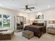 Main bedroom with large window and ample natural light at 10214 Chiltern Garden Dr, Orlando, FL 32827