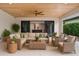 Inviting outdoor living space with comfortable seating, a ceiling fan, and seamless access to the indoors at 10214 Chiltern Garden Dr, Orlando, FL 32827