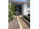 Charming condo complex exterior featuring a walkway and staircase leading to upper units at 134 W America St # 29, Orlando, FL 32801