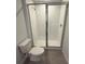 Modern bathroom with a large shower and toilet at 2334 Zaballina Pl, Kissimmee, FL 34747