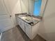 Bathroom with granite countertop and sink at 2334 Zaballina Pl, Kissimmee, FL 34747