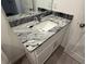 Bathroom with granite countertop and sink at 2334 Zaballina Pl, Kissimmee, FL 34747