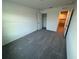 Spacious bedroom with grey carpet and a closet at 2334 Zaballina Pl, Kissimmee, FL 34747