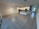 Spacious dining area with tile flooring and kitchen view at 2334 Zaballina Pl, Kissimmee, FL 34747