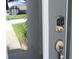 Modern front door with keyless entry system at 2334 Zaballina Pl, Kissimmee, FL 34747