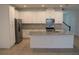 Modern kitchen with granite countertops and stainless steel appliances at 2334 Zaballina Pl, Kissimmee, FL 34747
