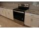 Stainless steel range and oven with granite countertops at 2334 Zaballina Pl, Kissimmee, FL 34747