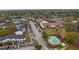 Aerial view of a community featuring lush landscaping and a sparkling pool at 314 Cherokee Ct # H, Altamonte Springs, FL 32701