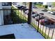 Private balcony with metal railing overlooking parking lot at 314 Cherokee Ct # H, Altamonte Springs, FL 32701