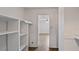 Walk-in closet with ample shelving at 314 Cherokee Ct # H, Altamonte Springs, FL 32701