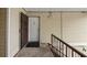 Condo entryway featuring unit door with a secure metal grate door and the unit letter 'H' on the white main door at 314 Cherokee Ct # H, Altamonte Springs, FL 32701