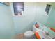 Simple half bathroom with a pedestal sink and toilet at 704 Monroe Harbor Pl, Sanford, FL 32773
