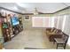 Spacious living room with large windows and ample natural light at 704 Monroe Harbor Pl, Sanford, FL 32773