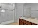 Bathroom with shower, vanity, and toilet at 9355 Westmorely St, Groveland, FL 34736
