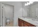 Double vanity bathroom with separate toilet and tub at 9355 Westmorely St, Groveland, FL 34736