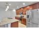 Stainless steel appliances and granite countertops at 9355 Westmorely St, Groveland, FL 34736