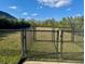 Fenced dog park with double gates for pets to enjoy at 9620 English Laurel E Ct, Orlando, FL 32827