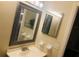 Clean bathroom with vanity, mirror, and shower at 134 W America St # 29, Orlando, FL 32801