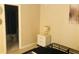 Bedroom with ensuite bathroom and nightstand at 134 W America St # 29, Orlando, FL 32801