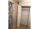 Spacious closet with built-in shelving and hanging rod at 134 W America St # 29, Orlando, FL 32801