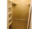 Spacious closet with built-in shelving and hanging rod at 134 W America St # 29, Orlando, FL 32801