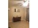 Simple living room with tile floors and wall art at 134 W America St # 29, Orlando, FL 32801