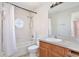 Bathroom with a bathtub, shower, and a wood vanity with a white countertop at 14112 Morning Frost Dr, Orlando, FL 32828