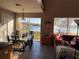 Kitchen dining area with lake view and wooden table at 14112 Morning Frost Dr, Orlando, FL 32828