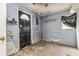 Garage with blue painted walls and concrete flooring at 1603 Doreen Ave, Ocoee, FL 34761