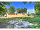 Backyard featuring home's exterior with green space and blue skies at 2341 Hadley St, Deltona, FL 32738