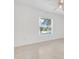 Bright bedroom features light tile flooring and large window at 2341 Hadley St, Deltona, FL 32738