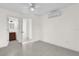 Bedroom with ceiling fan, tile floors and access to bathroom at 2341 Hadley St, Deltona, FL 32738