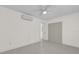 Bright bedroom with ceiling fan and double door closet at 2341 Hadley St, Deltona, FL 32738