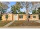 Single-story home with a well-maintained lawn and a concrete pathway to the front door at 2341 Hadley St, Deltona, FL 32738
