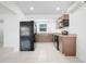 Modern kitchen featuring granite countertops and stainless steel appliances at 2341 Hadley St, Deltona, FL 32738
