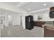 Modern kitchen with dark wood cabinets and granite counters at 2341 Hadley St, Deltona, FL 32738