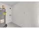 Laundry area with new water heater and tile floor at 2341 Hadley St, Deltona, FL 32738