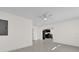 Open concept living room with tile floors offering a view of the kitchen at 2341 Hadley St, Deltona, FL 32738
