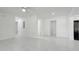 Bright, spacious living room with views of kitchen area at 2341 Hadley St, Deltona, FL 32738