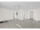 Spacious living room featuring tile floors and neutral walls at 2341 Hadley St, Deltona, FL 32738