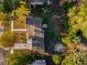 Top-down view of a home showing the roof, yard, and tree coverage at 2341 Hadley St, Deltona, FL 32738