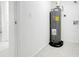 Utility room with hot water heater and washer/dryer hookups at 2341 Hadley St, Deltona, FL 32738